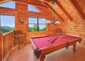 game room with pool table in a Gatlinburg cabin rental