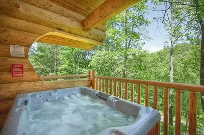 hot tub on deck of 2 bedroom cabin in gatlinburg