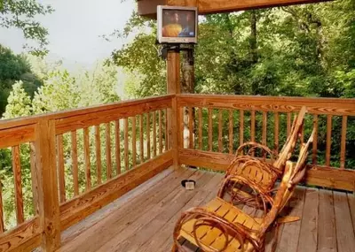 mountain whispers front deck of a gatlinburg cabin