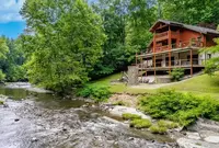 Ogle River Lodge on the River cabin next to river