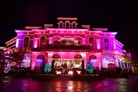 Dollywood sign and Showstreet Palace Theater lit up with Christmas lights