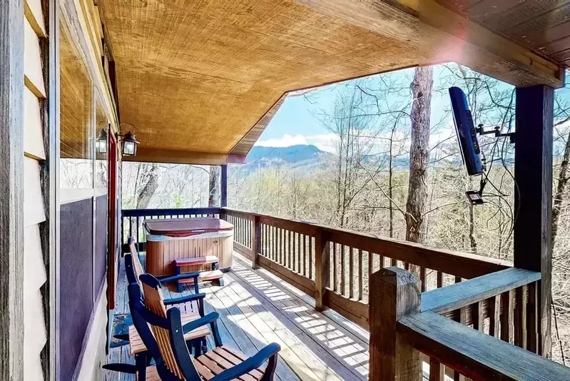 Mountain Whispers hot tub on deck with mountain view