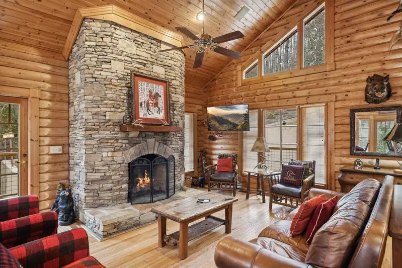 Ogle Lodge on the River living room with stone fireplace